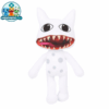 Mimic plush toy with a wide red toothy grin on a shelf