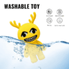 Yellow Antlered Anomaly plush with small antlers and a grin