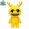 Yellow Antlered Anomaly plush with small antlers and a grin